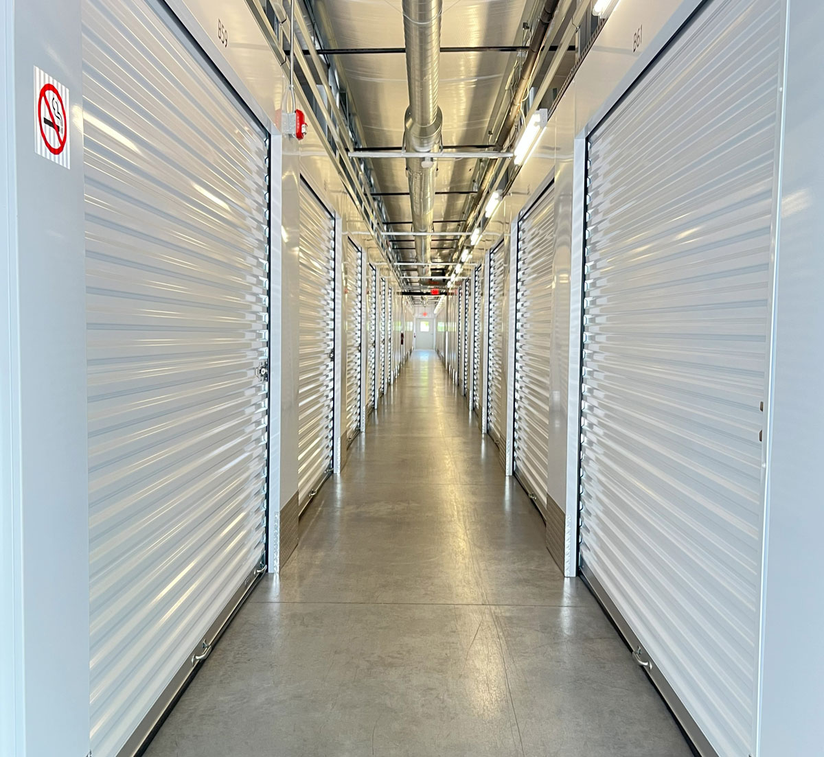 hallway with storage units
